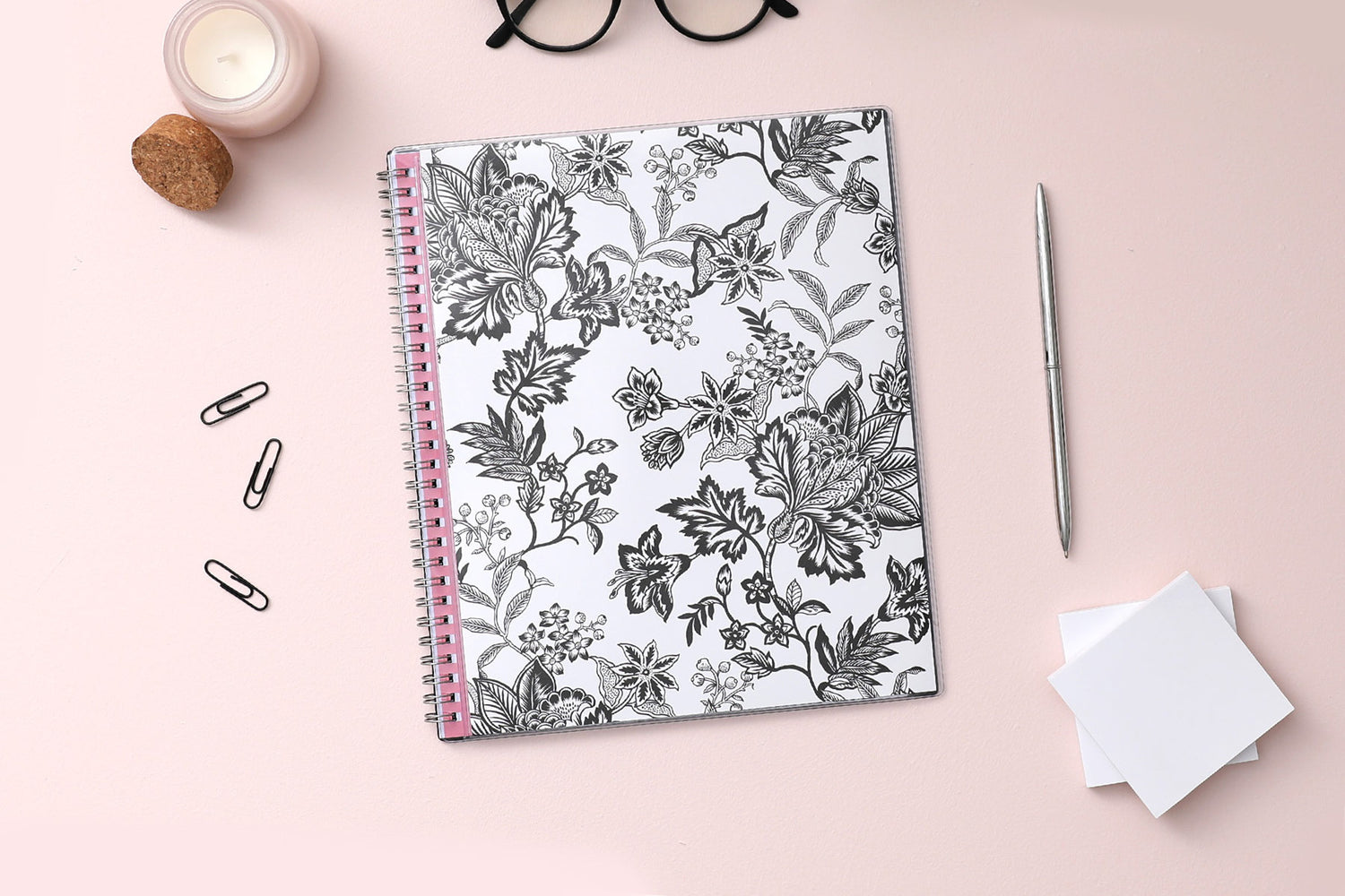 2025 monthly planner from Blue Sky featuring a floral pattern in black and white with twin silver wire-o binding and compact 8x10 size