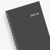 monthly academic professional planner featuring a solid charcoal cover and silver twin wire-o binding in 5x8