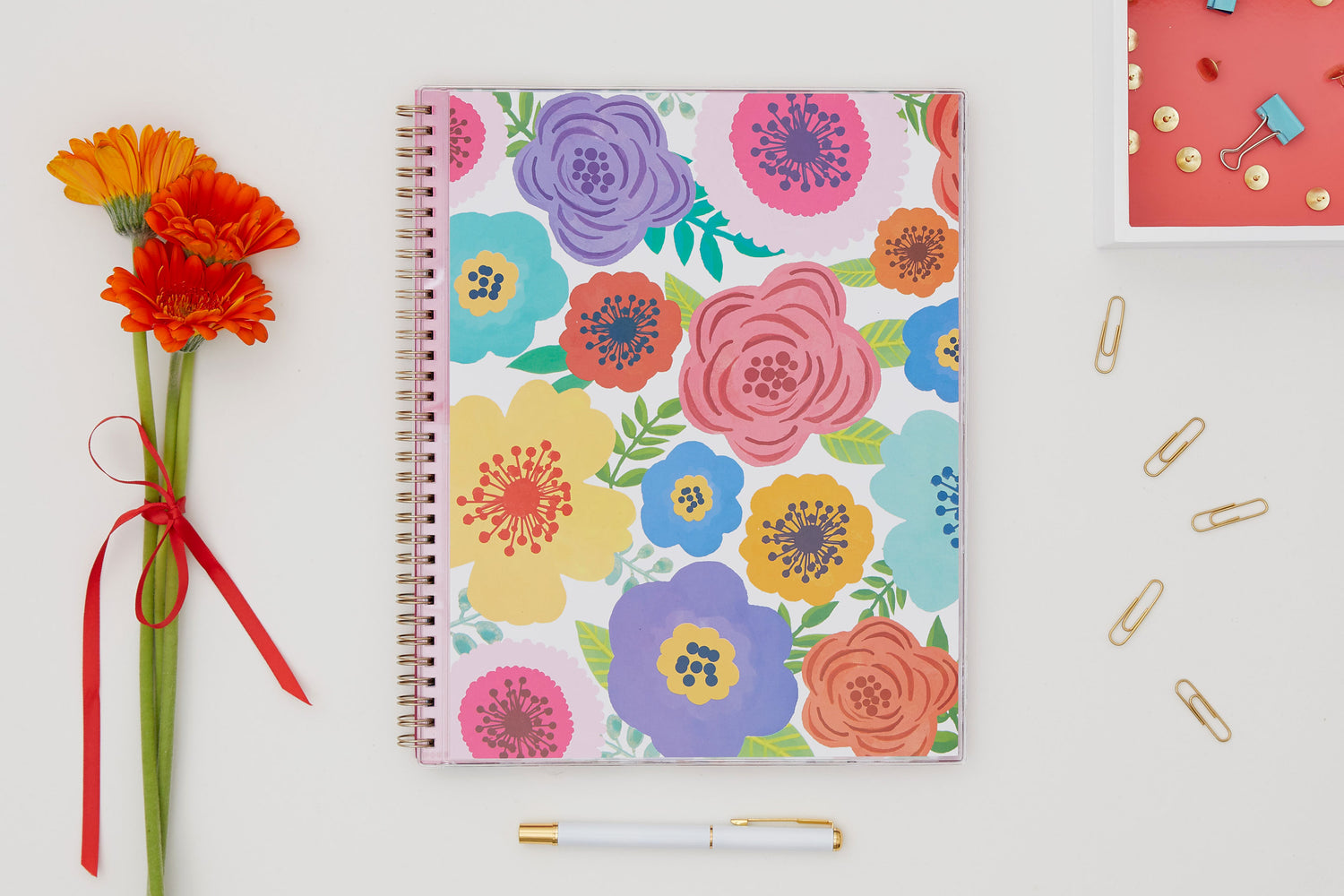 academic weekly monthly planner featuring a floral front cover and twin wire-o binding