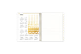 gold sticker sheet, paper pocket, monthly tabs and reference calendar on this 8.5x11 planner