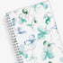 January 2025 to December 2025 weekly and monthly planner from Blue Sky featuring a floral pattern in hues of blue with twin silver wire-o binding and compact 5x8 size