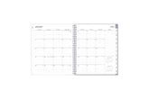 2025 monthly planner featuring a monthly spread with boxed dates, lined writing space, reference calendar, notes section, and light blue monthly tabs