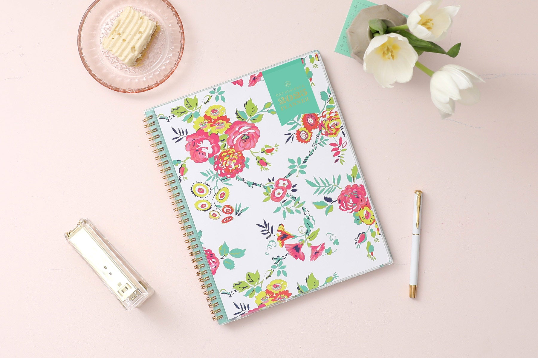 This January 2025 to December 2025 weekly monthly 5x8 planner featuring yellow and pink floral front cover pattern and gold twin wire-o binding