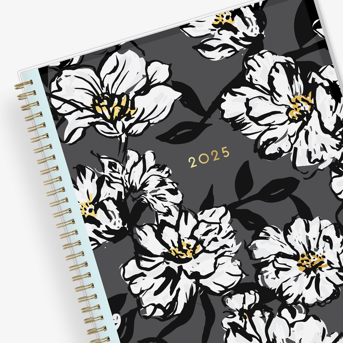 8.5x11 weekly monthly planner for January 2025 - December 2025 new year featuring silver twin wire-o binding, black/gray background, white florals and gold accents