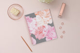 Take planning to the next level with this 2025 weekly monthly planner from Blue Sky featuring a cover with beautiful roses in shades of pink, rose gold twin wire-o binding in 8.5x11 planner size, and flexible front cover.