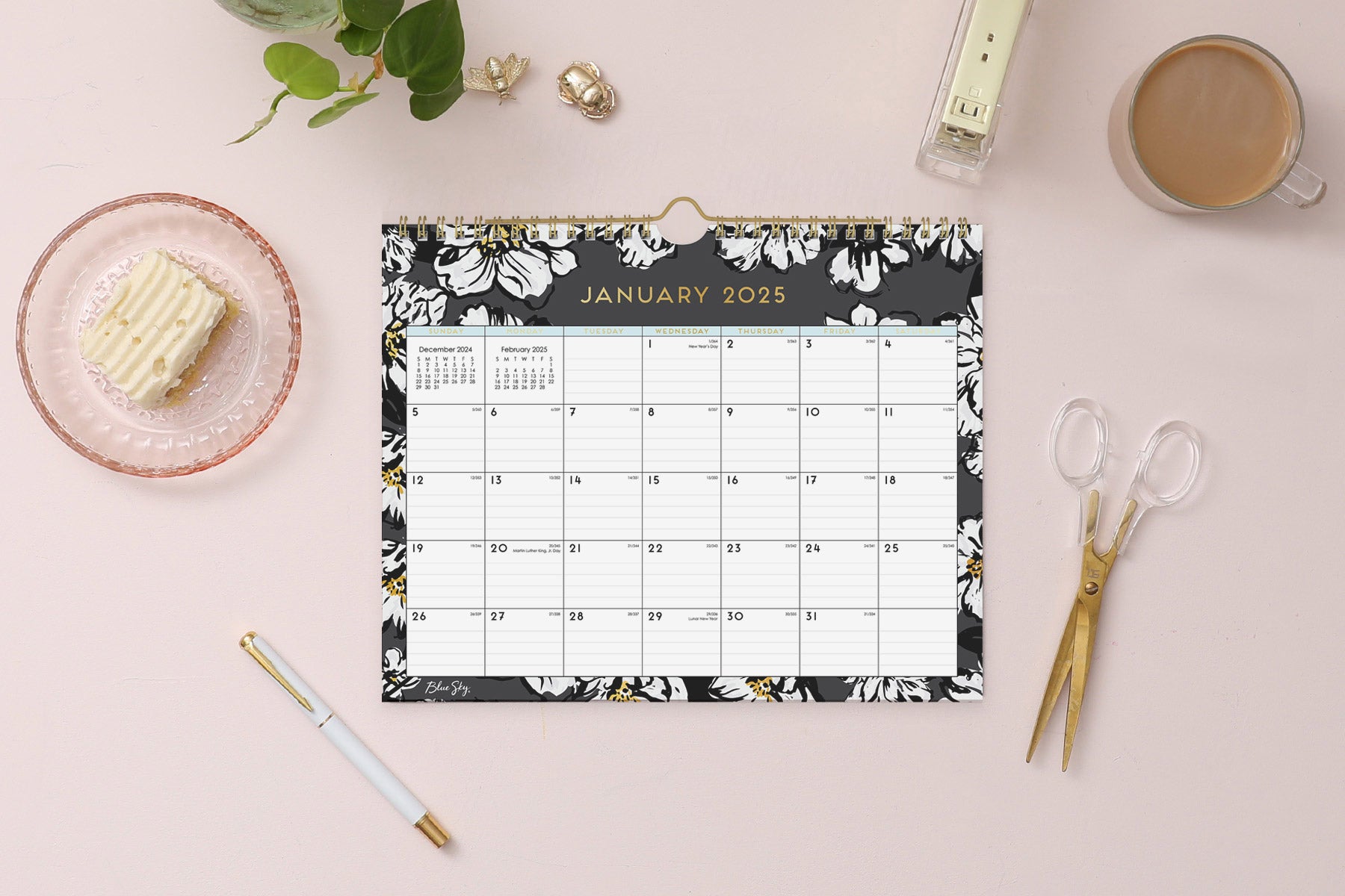 11x8.75 wall calendar for 2025 in baccara dark design featuring gold accents for months and days, black/grey background and white florals