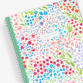 academic teacher lesson planner with weekly and monthly layouts featuring a multi colored floral front cover in 8.5x11 planner size 2025-2026