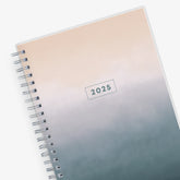 January 2025 to December 2025 weekly monthly planner in 5x8 size for blue sky with grey background and ombre cloud front cover, silver twin wire-o binding
