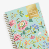 2025-2026 weekly monthly academic planner for the school year in mint background and floral patterns in 5.875x8.625 size, gold wire binding