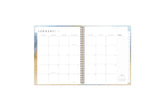 January 2025 - December 2025 weekly monthly planner featuring a monthly spread boxes for each day, blank writing space, notes section, reference calendars, and light purple monthly tabs in 8.5x11 size