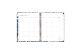 the 2025 weekly monthly planner by blue sky features a monthly spread with ample blank white writing space, lined notes section, reference calendar, and white monthly tabs