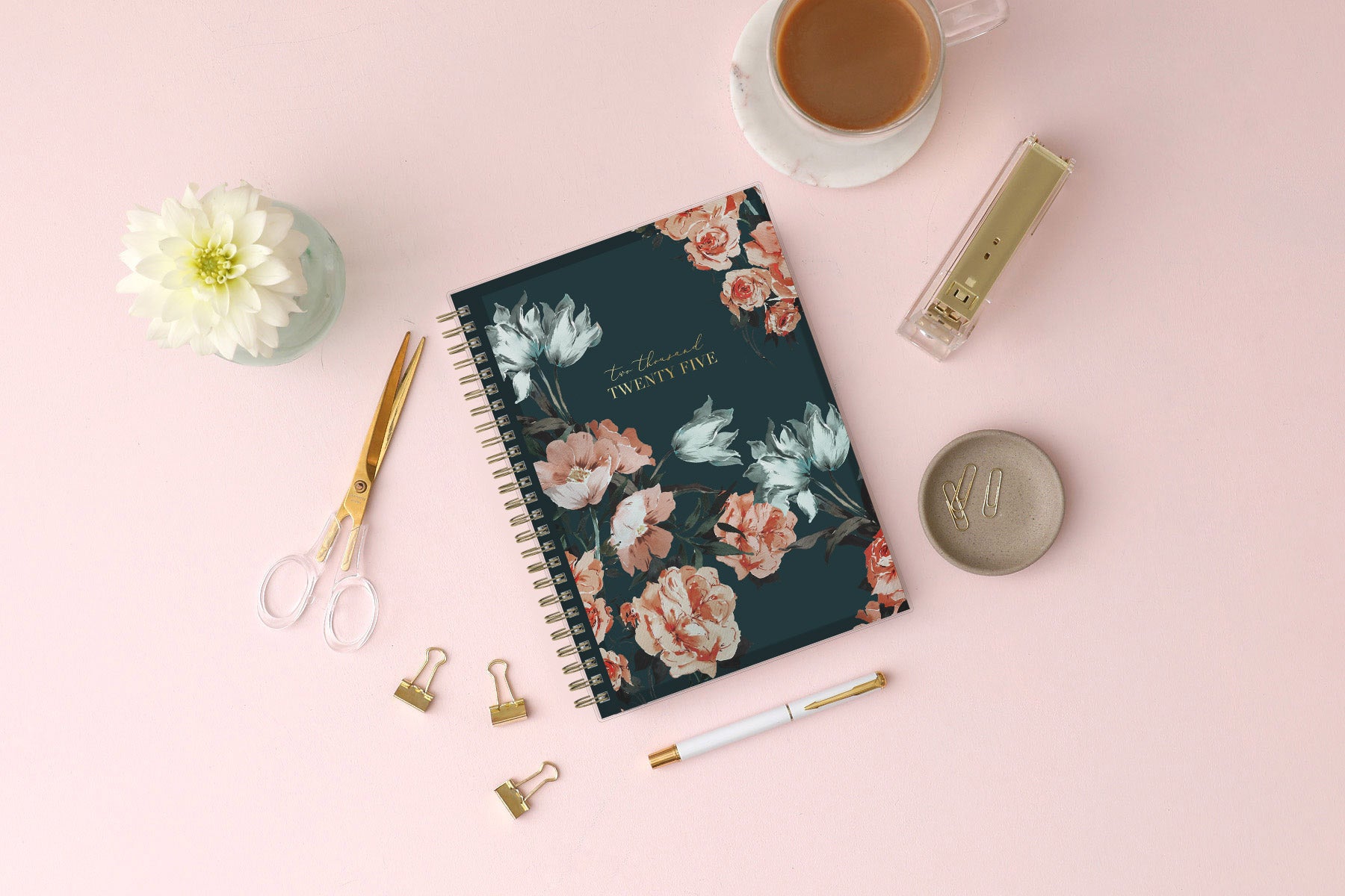 The Life Note-It collection by Blue Sky features this beautiful floral pattern front cover in a 5.875x8.625 planner size with gold twin wire-o binding for the new 2025 year.