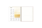 gold sticker sheet, storage pocket, and reference calendars on 8.5x11 planner
