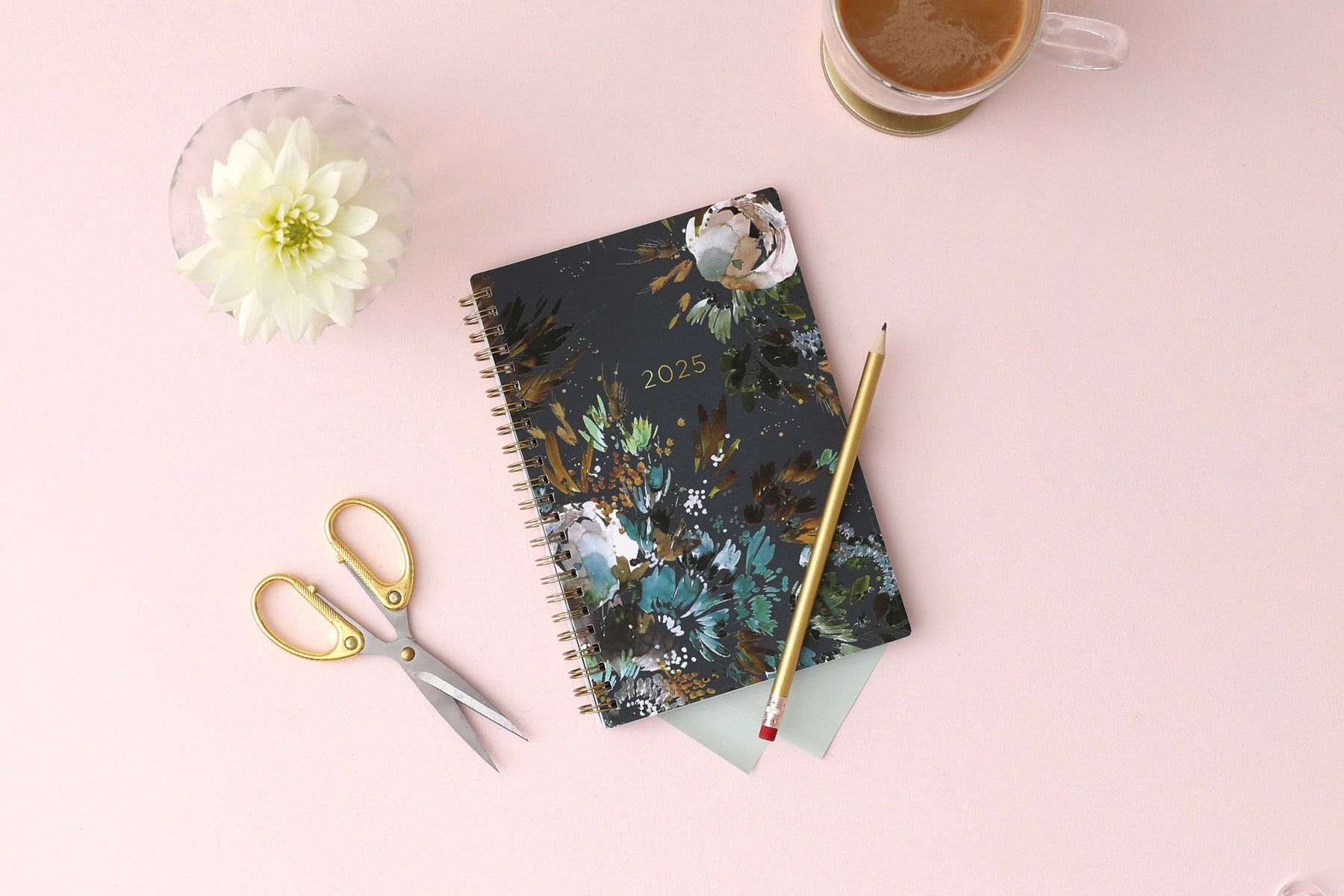 The kelly ventura 2025 weekly monthly planner for blue sky features beautiful watercolored floral cover with gold twin wire-o binding in a 5x8 planner size.