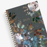 The kelly ventura 2025 weekly monthly planner for blue sky features beautiful watercolored floral cover with gold twin wire-o binding in a 5x8 planner size.