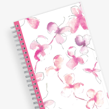 breast cancer awareness 2025 planner by blue sky featuring beautiful pink orchids and white background on the front cover in a 5x8 size