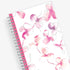 breast cancer awareness 2025 planner by blue sky featuring beautiful pink orchids and white background on the front cover in a 5x8 size