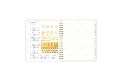gold sticker sheets, reference calendars, paper pocket in this 8x10 daily planner