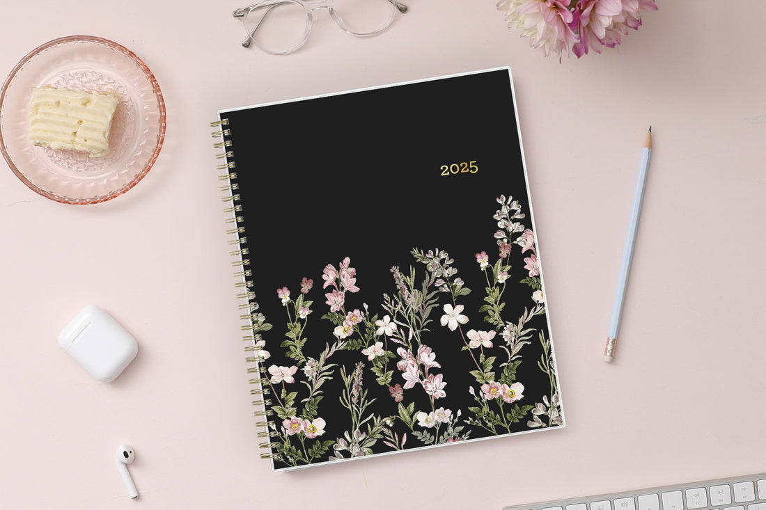 January 2025 - December 2025 monthly planner from Blue Sky features beautiful floral cover design with black background and gold binding