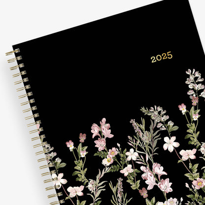January 2025 - December 2025 monthly planner from Blue Sky features beautiful floral cover design with black background and gold binding