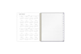 This 8.5x11 2025 weekly monthly planner featuring a yearly overview for both 2025 and 2026, a yearly goals recap to review end of the year, and contact page.