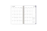 This January 2025 - December 2025 weekly monthly planner features a monthly spread with blank writing space for each day, lined notes section, reference calendars, and monthly tabs for easy navigating in a 8.5x11 planner size