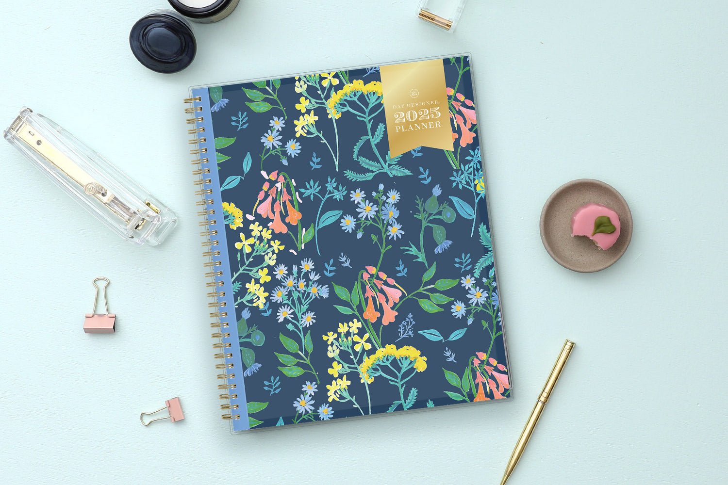 January 2025 - December 2025 weekly monthly planner in 5x8 size from day designer for blue sky with navy background and floral design, and gold twin wire-o binding