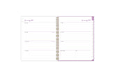 2025 planner featuring a weekly spread with lined writing space, bullet points, and monthly white tabs with purple text.
