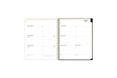 2025 planner featuring a weekly spread with lined writing space, bullet points, and monthly white tabs with gold text.
