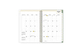 2025 planner featuring a monthly spread with lined writing space, bullet points, and monthly white tabs with gold text.
