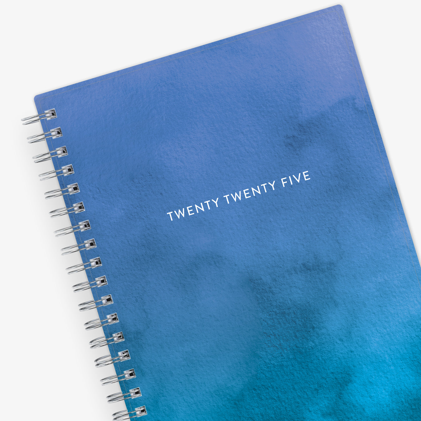January 2025 to December 2025 weekly planner featuring a solid flexible oceanic ombre front cover, silver twin wire-o, and a compact 5x8 size planner