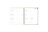 2025 planner featuring a weekly spread with lined writing space, bullet points, and monthly white tabs with gold text.