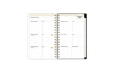 2025 planner featuring a weekly spread with lined writing space, bullet points, and monthly white tabs with gold text.
