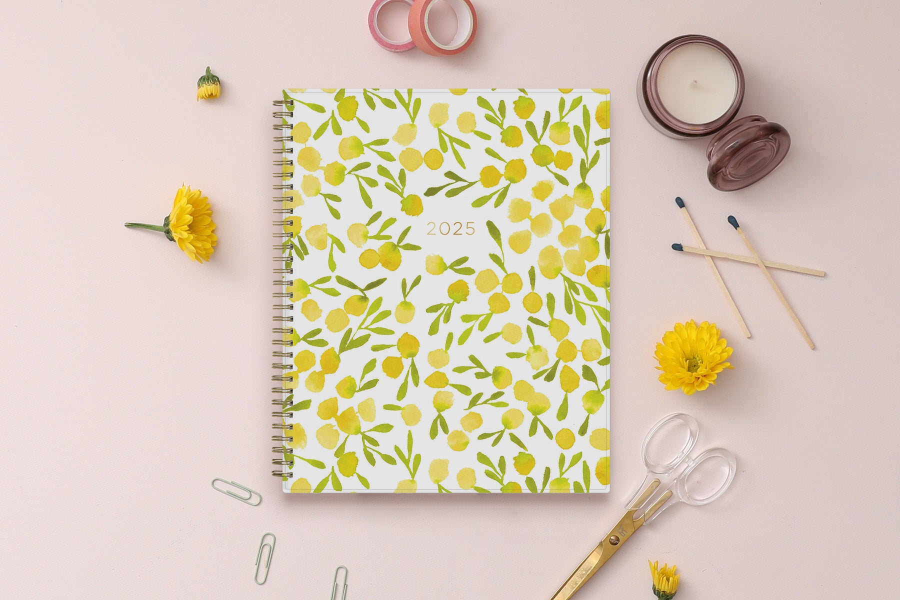 The kelly ventura 2025 weekly monthly planner for blue sky features beautiful lemons cover with gold twin wire-o binding in a 8.5x11 planner size.