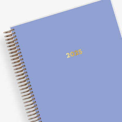 Light purple-blue front cover on this 2025 7x9 livewell weekly planner