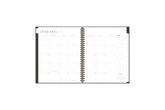 2025 planner featuring a weekly spread with dotted lined/blank writing space, and monthly white tabs
