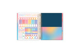 7x9 planner features a sticker sheet, double sided pocket, and monthly tabs