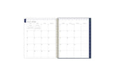 2025-2026 academic planner in 8.5x11 size featuring a monthly spread with box for each day, clean writing space, and lined notes section