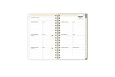 2025 planner featuring a weekly spread with lined writing space, bullet points, and monthly white tabs with gold text.
