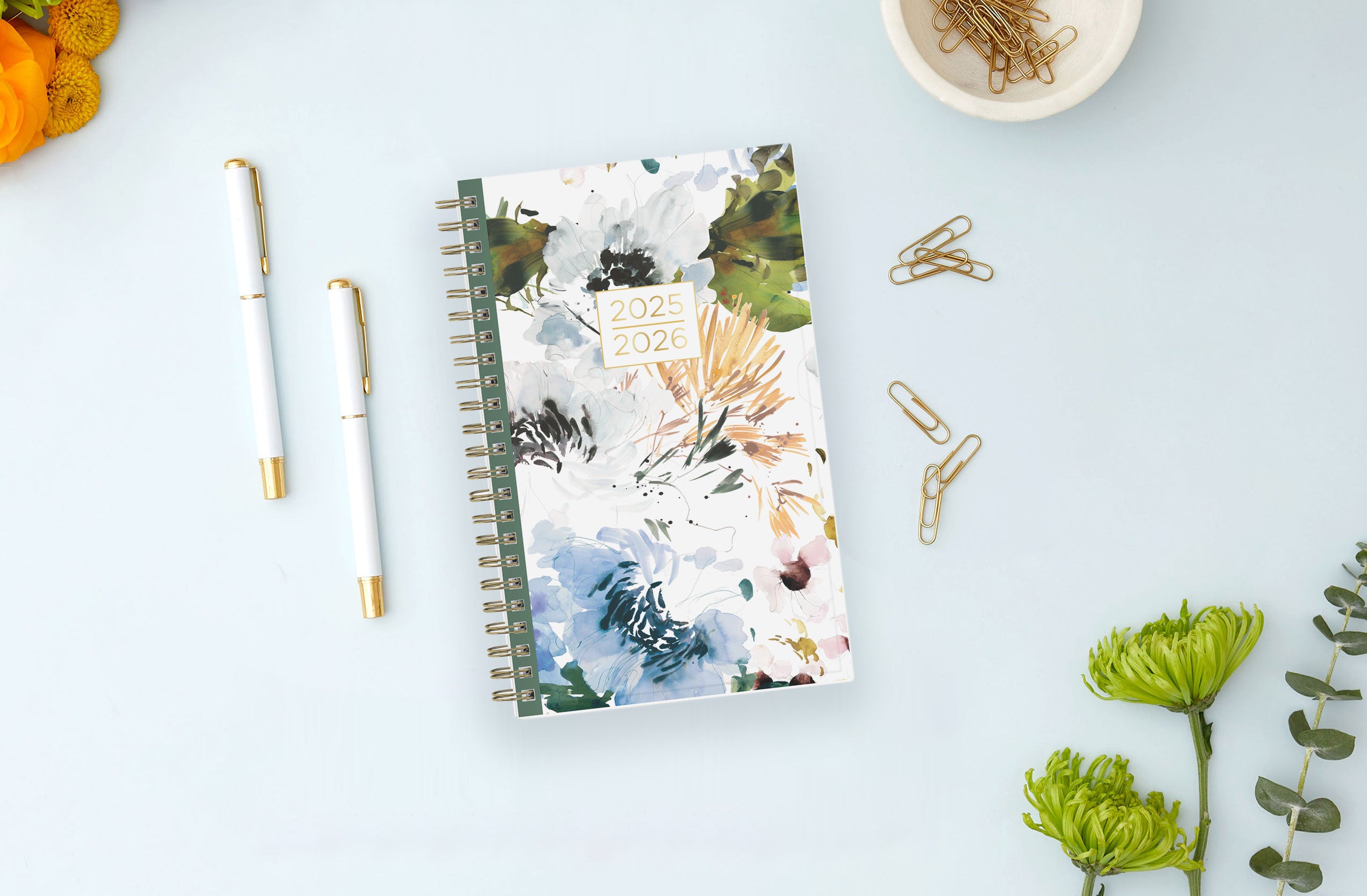 floral front cover on this july 2025 - june 2026 weekly monthly academic planner in 5x8 size