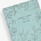 simple lined floral front cover on this teacher lesson planner for 2025-2026