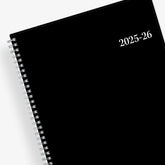 2025-2026 professional weekly monthly planner in 8.5x11 size and black front cover