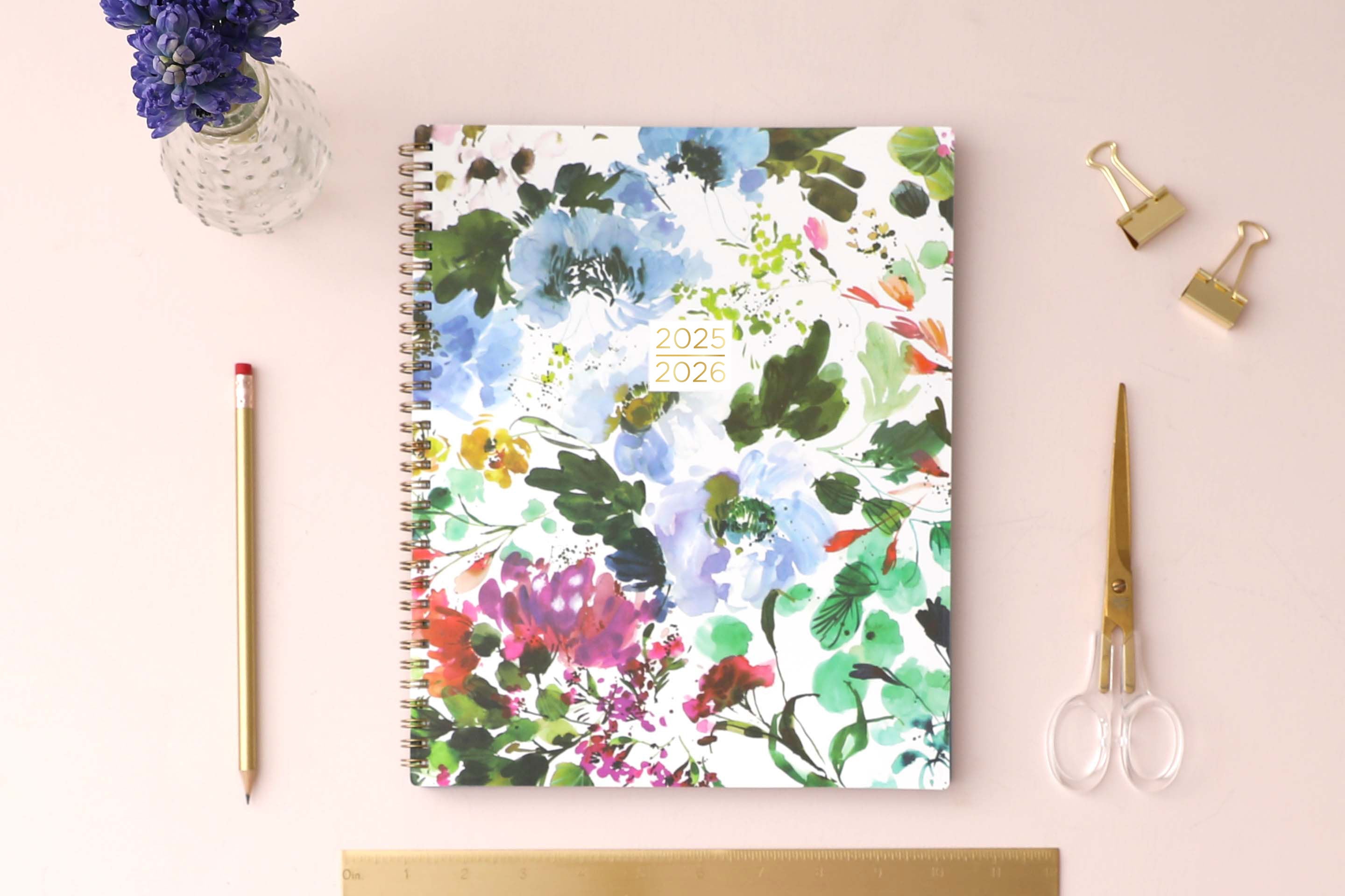 Kelly Ventura for Blue Sky student academic planner in 8.5x11 planner size with brush floral front cover, twin wire-o binding and a weekly monthly layout for July 2025-  June 2026