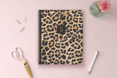 leopard print front cover on this 2025-2026 academic planner 8.5x11