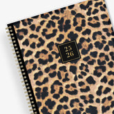 leopard print front cover on this 2025-2026 academic planner 8.5x11