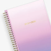 This planner notes dated July 2025-2026 has a purple ombre front cover