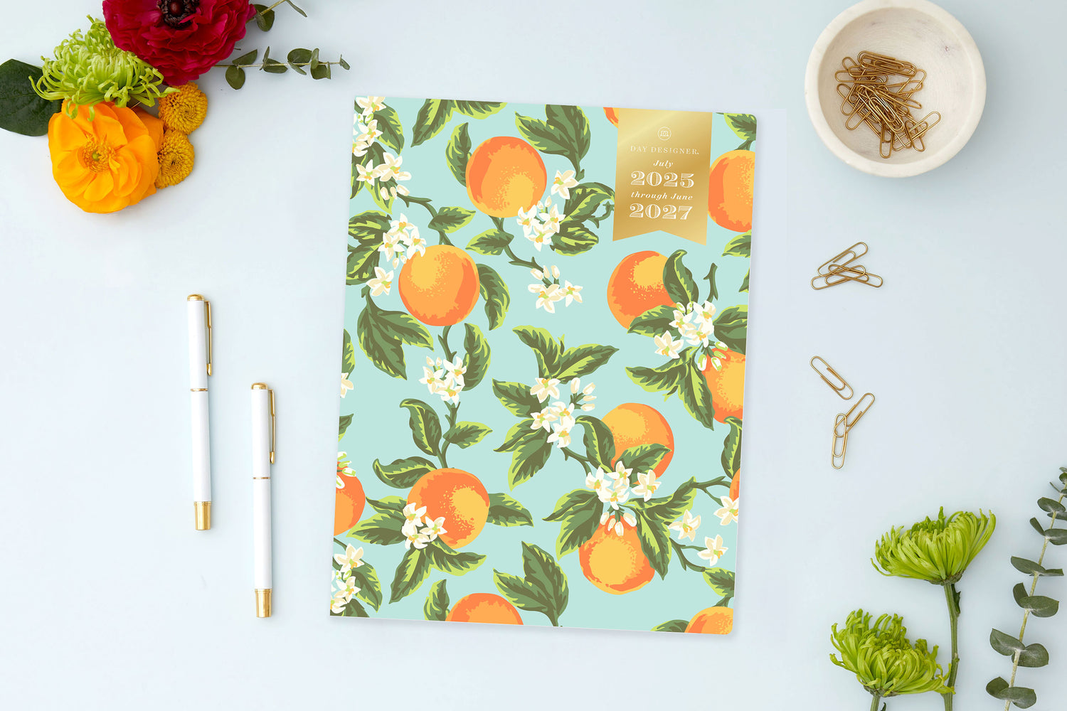 orange mint blossom front cover on this 8.5x11 monthly stapled planner