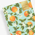 orange mint blossom front cover on this 8.5x11 monthly stapled planner