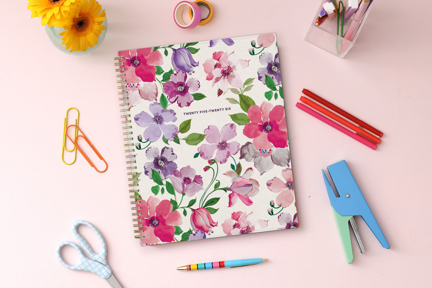 2025-2026 academic weekly monthly planner. Floral front cover with beige background.