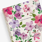 2025-2026 academic weekly monthly planner. Floral front cover with beige background.